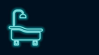 Parlayan neon hattı küvet simgesi siyah arkaplanda izole edildi. 4K Video hareketli grafik canlandırması