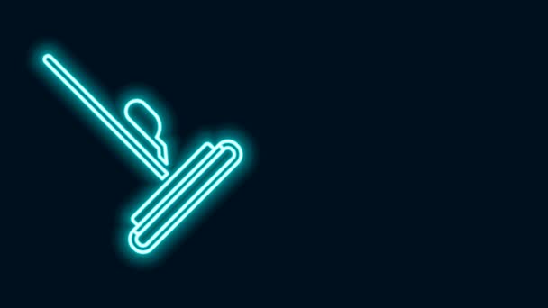 Gloeiende neon lijn Dweil pictogram geïsoleerd op zwarte achtergrond. Schoonmaakservice concept. 4K Video motion grafische animatie — Stockvideo