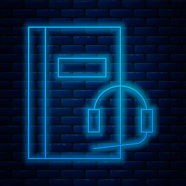 Glowing neon line Audio book icon isolated on brick wall background. Book with headphones. Audio guide sign. Online learning concept.  Vector Illustration.