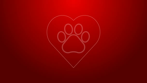 Green line Heart with animals footprint icon isolated on red background. Pet paw in heart. Love to the animals. 4K Video motion graphic animation — Stock Video