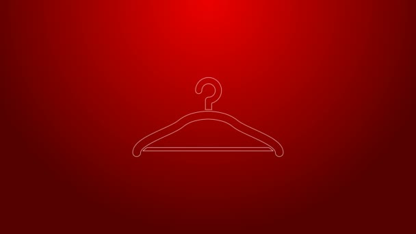 Grüne Linie Kleiderbügel Symbol isoliert auf rotem Hintergrund. Garderoben-Ikone. Kleiderservice-Symbol. Wäscheständer-Schild. 4K Video Motion Grafik Animation — Stockvideo