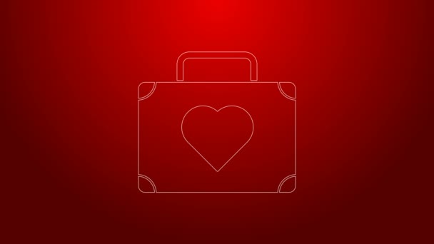 Kırmızı arka planda kalp simgesi olan yeşil bavul. Balayı sembolü. Seyahat bagaj tabelası. Seyahat bagaj ikonu. 4K Video hareketli grafik canlandırması — Stok video