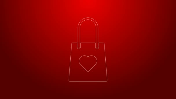 Grön linje Shopping väska med hjärta ikon isolerad på röd bakgrund. Shopping väska butik älskar som hjärta ikon. Alla hjärtans dag symbol. 4K Video motion grafisk animation — Stockvideo