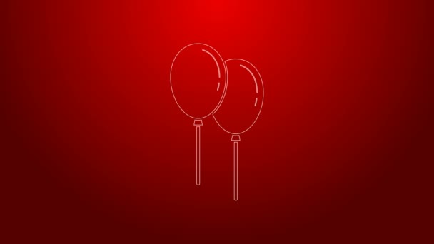 Green line Balloons with ribbon icon isolated on red background. 4K Video motion graphic animation — Stock Video