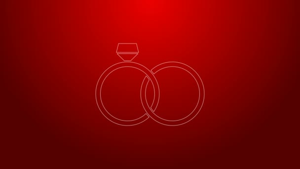 Grön linje Bröllop ringar ikon isolerad på röd bakgrund. Brud- och brudgummens smyckesskylt. Äktenskapsikonen. Diamantringsikon. 4K Video motion grafisk animation — Stockvideo
