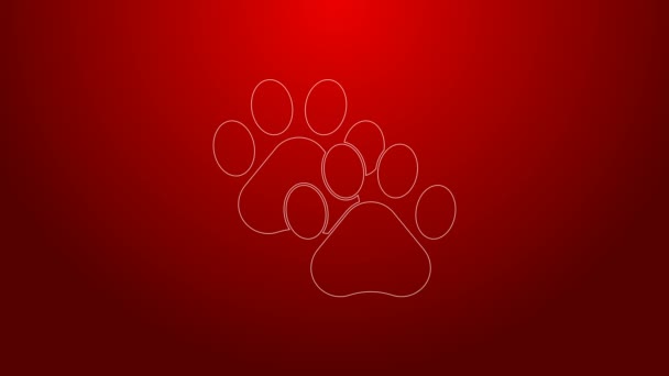 Linha verde ícone de impressão Paw isolado no fundo vermelho. Impressão de pata de cão ou gato. Pista animal. Animação gráfica em movimento de vídeo 4K — Vídeo de Stock