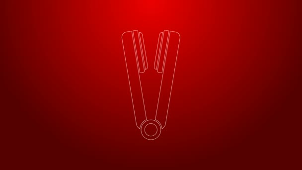 Zelená čára Curling železo pro vlasy ikona izolované na červeném pozadí. Ikona narovnávače vlasů. Grafická animace pohybu videa 4K — Stock video
