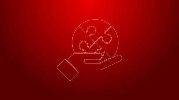Green line Piece of puzzle in hand icon isolated on red background. Business, marketing, finance, template, layout, infographics concept. 4K Video motion graphic animation — Stock Video
