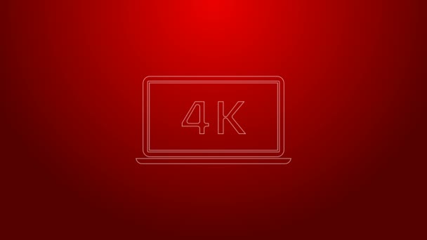 Grüne Linie Laptop-Bildschirm mit 4k-Videotechnologie-Symbol isoliert auf rotem Hintergrund. 4K Video Motion Grafik Animation — Stockvideo