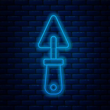 Parlayan neon hattı Trowel simgesi tuğla duvar arka planında izole edildi. Vektör.