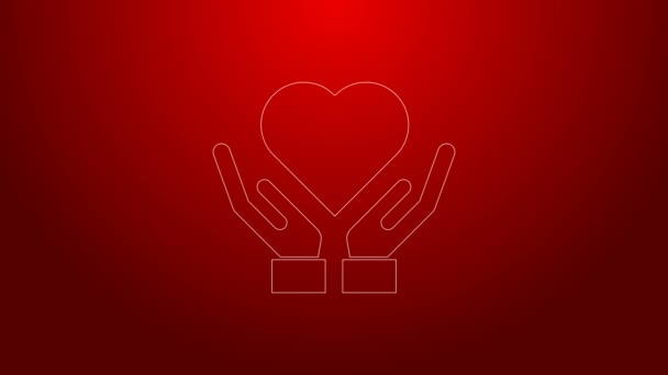 Grüne Linie Herz auf der Hand Symbol isoliert auf rotem Hintergrund. Hand, die Liebe symbolisiert. Valentinstag-Symbol. 4K Video Motion Grafik Animation — Stockvideo