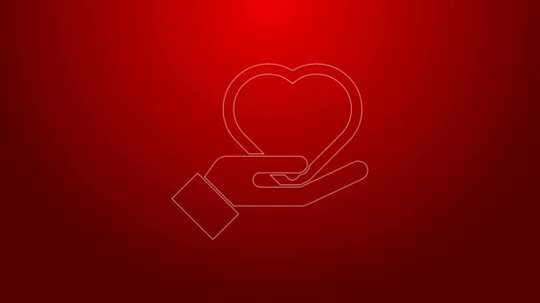 Línea verde Corazón en la mano icono aislado sobre fondo rojo. Mano dando símbolo de amor. Símbolo de San Valentín. Animación gráfica de vídeo 4K — Vídeo de stock
