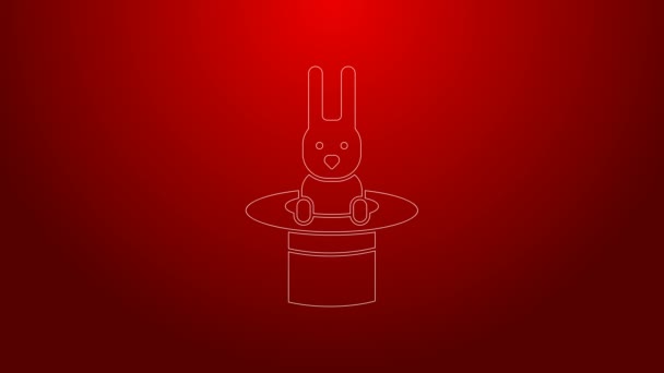 Green line Magician hat and rabbit icon isolated on red background. Magic trick. Mystery entertainment concept. 4K Video motion graphic animation — Stock Video