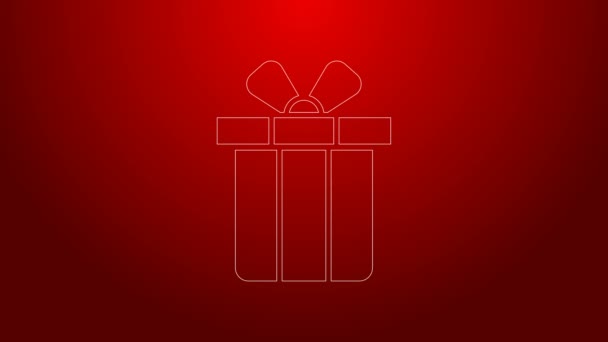 Grüne Linie Geschenk-Box-Symbol isoliert auf rotem Hintergrund. Frohe Weihnachten und ein gutes neues Jahr. 4K Video Motion Grafik Animation — Stockvideo
