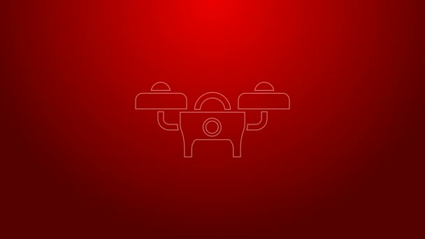 绿线无人机飞行图标隔离在红色背景。带视频和照相相机符号的四合彩机。4K视频运动图形动画 — 图库视频影像