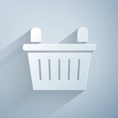 Kağıt kesiği bisiklet sepeti simgesi gri arkaplanda izole edilmiş. Kağıt sanatı tarzı. Vektör.