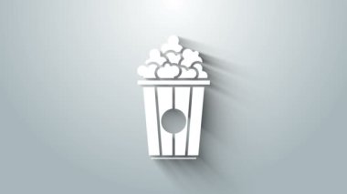 Beyaz patlamış mısır, gri arka planda izole edilmiş karton kutu simgesinde. Patlamış mısır kutusu. 4K Video hareketli grafik canlandırması