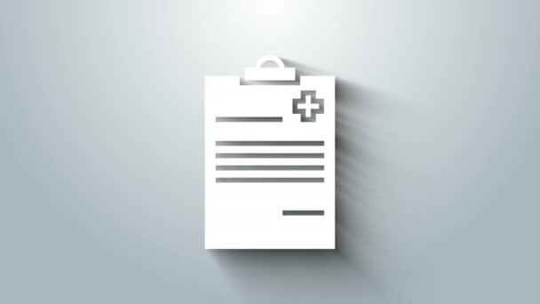 Λευκό Ιατρικό πρόχειρο με κλινικό εικονίδιο καταγραφής που απομονώνεται σε γκρι φόντο. Έντυπο ασφάλισης υγείας. Συνταγή, αναφορά ιατρικών εξετάσεων. 4K Γραφική κίνηση κίνησης βίντεο — Αρχείο Βίντεο