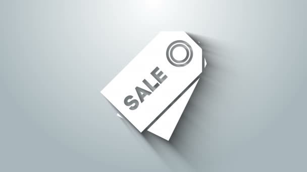 Белый ценник с надписью Sale icon, выделенный на сером фоне. Значок по цене. Акция скидка. Видеографическая анимация 4K — стоковое видео