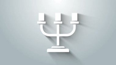 Beyaz şamdan simgesi gri arkaplanda izole edildi. 4K Video hareketli grafik canlandırması