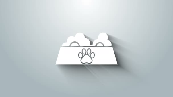 Bílá miska krmiva pro kočky nebo psy ikona izolované na šedém pozadí. Otisk psí nebo kočičí tlapky. Grafická animace pohybu videa 4K — Stock video