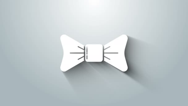 Ikona kravaty s bílým motýlkem izolovaná na šedém pozadí. Grafická animace pohybu videa 4K — Stock video