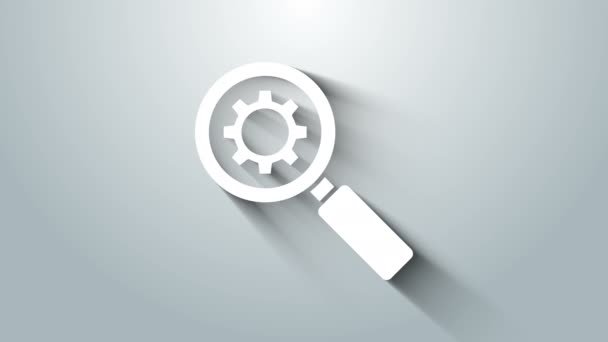 White Magnifying glass and gear icon isolated on grey background. Search gear tool. Business analysis symbol. 4K Video motion graphic animation — Stock Video