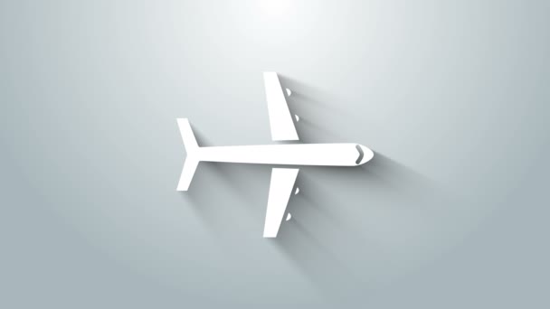 グレーの背景に白い面のアイコンが孤立しています。飛行機のアイコン。航空会社の看板。4Kビデオモーショングラフィックアニメーション — ストック動画