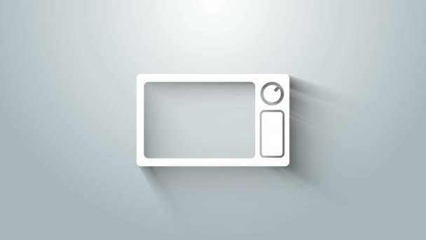 灰色の背景に分離された白い電子レンジのアイコン。家電製品のアイコン。4Kビデオモーショングラフィックアニメーション — ストック動画