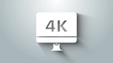 Gri arkaplanda 4k video teknolojisi ikonu olan beyaz bilgisayar monitörü görüntüsü. 4K Video hareketli grafik canlandırması