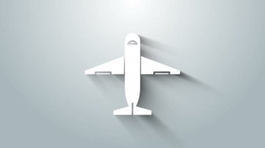 Beyaz düzlem simgesi gri arkaplanda izole edildi. Teslimat, ulaşım. Kargo hava yoluyla geliyor. Paketli uçaklar, kutular. 4K Video hareketli grafik canlandırması