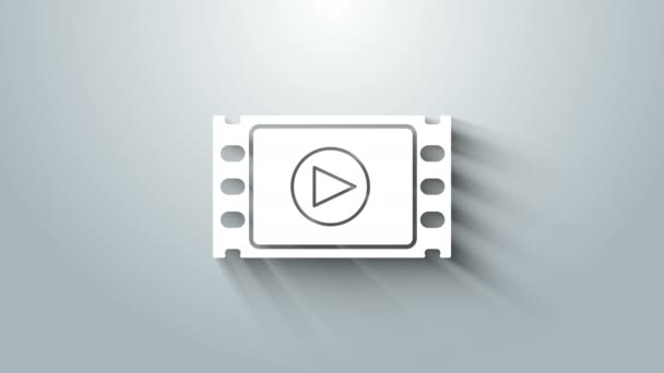 Vit Play Video ikonen isolerad på grå bakgrund. Filmremsa med lekskylt. 4K Video motion grafisk animation — Stockvideo