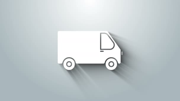 グレーの背景に隔離されたホワイトデリバリー貨物トラック車両アイコン。4Kビデオモーショングラフィックアニメーション — ストック動画
