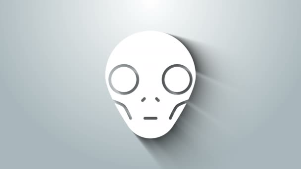 Ikona White Alien izolovaná na šedém pozadí. Mimozemská mimozemská tvář nebo symbol hlavy. Grafická animace pohybu videa 4K — Stock video