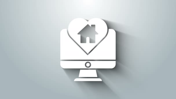 Biały monitor komputerowy z ikoną domu w kształcie serca na szarym tle. Symbol domu miłości. Rodzina, nieruchomości i nieruchomości. 4K Animacja graficzna ruchu wideo — Wideo stockowe