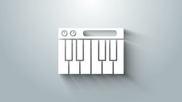 Ikona syntezatora muzyki białej izolowana na szarym tle. Elektroniczne pianino. 4K Animacja graficzna ruchu wideo — Wideo stockowe