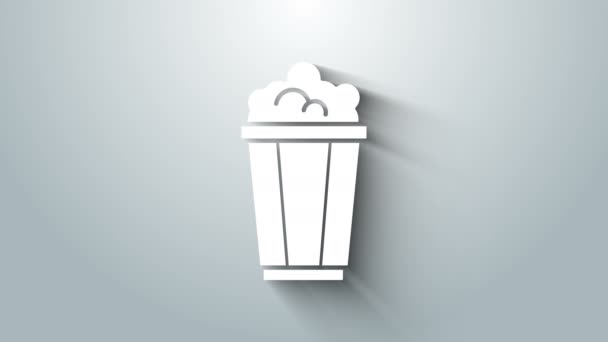 Fehér popcorn kartondobozban ikon elszigetelt szürke alapon. Popcorn vödör doboz. 4K Videó mozgás grafikus animáció — Stock videók
