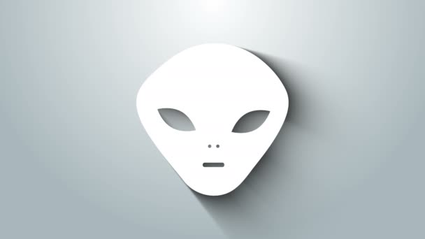 Icono Alien blanco aislado sobre fondo gris. Cara extraterrestre alienígena o símbolo de cabeza. Animación gráfica de vídeo 4K — Vídeos de Stock