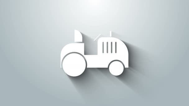Ikona bílého traktoru izolovaná na šedém pozadí. Grafická animace pohybu videa 4K — Stock video