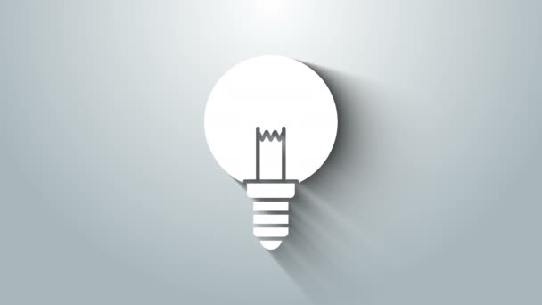 Белая лампочка с концепцией иконки идеи изолирована на сером фоне. Символ энергии и идеи. Концепция вдохновения. Видеографическая анимация 4K — стоковое видео
