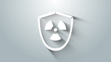 Beyaz Radyoaktif 'in kalkan simgesi gri arkaplanda izole edildi. Radyoaktif zehirli sembol. Radyasyon tehlikesi işareti. 4K Video hareketli grafik canlandırması