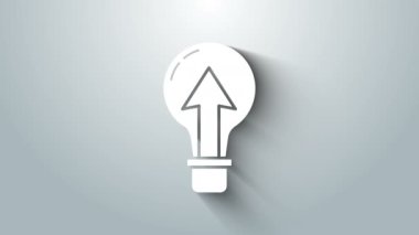 Gri arkaplanda beyaz ampul simgesi izole edildi. Enerji ve fikir sembolü. Lamba elektrikli. 4K Video hareketli grafik canlandırması