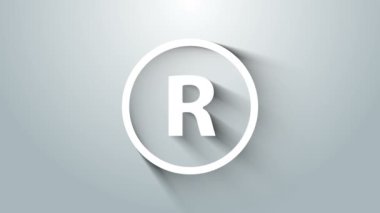 Beyaz tescilli ticari marka simgesi gri arkaplanda izole edildi. 4K Video hareketli grafik canlandırması