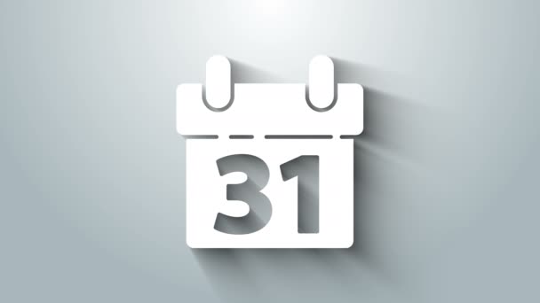 Fehér naptár ikon elszigetelt szürke háttér. Eseményemlékeztető szimbólum. Boldog karácsonyt és boldog új évet! 4K Videó mozgás grafikus animáció