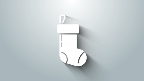 Λευκό χριστουγεννιάτικο κάλτσα εικονίδιο απομονώνονται σε γκρι φόντο. Καλά Χριστούγεννα και Καλή Χρονιά. 4K Γραφική κίνηση κίνησης βίντεο — Αρχείο Βίντεο