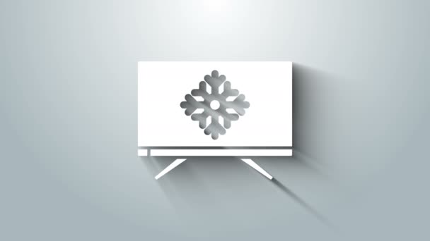 Vit God Jul på TV och snöflinga ikon isolerad på grå bakgrund. Gott nytt år. 4K Video motion grafisk animation — Stockvideo