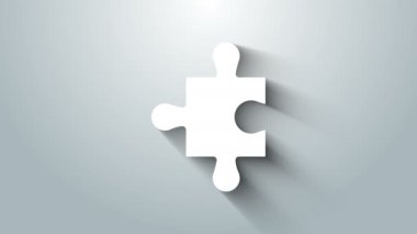 Gri arkaplanda beyaz yapboz parçası izole edildi. Modern daire, iş, pazarlama, finans, internet konsepti. 4K Video hareketli grafik canlandırması