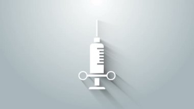 Gri zemin üzerinde iğne ikonu olan beyaz diş şırıngası. 4K Video hareketli grafik canlandırması