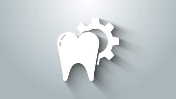 Піктограма процедури лікування білого зуба ізольована на сірому фоні. Ремонт зубів за допомогою обладнання. 4K Відео рух графічна анімація — стокове відео
