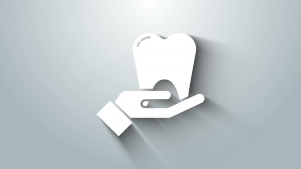 Icono de Diente Blanco aislado sobre fondo gris. Símbolo dental para clínica de odontología o centro médico dentista y paquete de pasta de dientes. Animación gráfica de vídeo 4K — Vídeo de stock